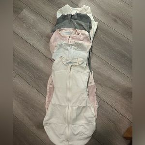 5 SNOO sleep sacks -3 large and 2 small. In good condition!